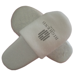 Disposable slippers of foam for hotel rooms