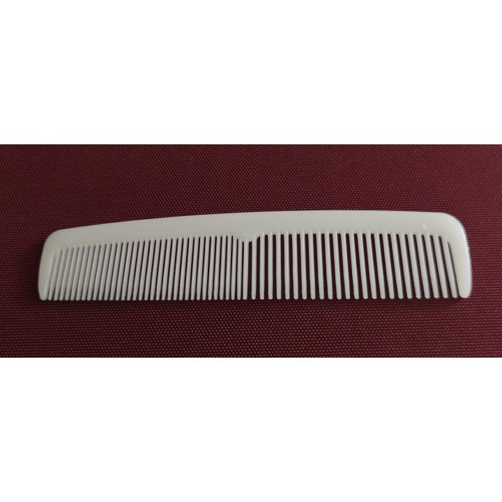 Biodegradable comb in recycled paper bag for hotels