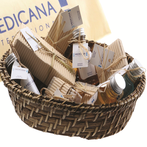 Colección de amenities en cajita de papel ondulado para hoteles
